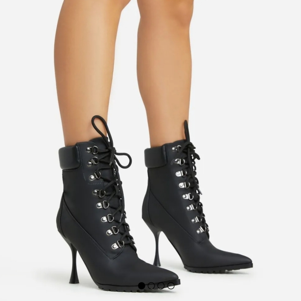 Black heeled lug bottom ankle boots